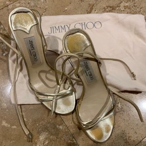Jimmy Choo gold heeled sandals.